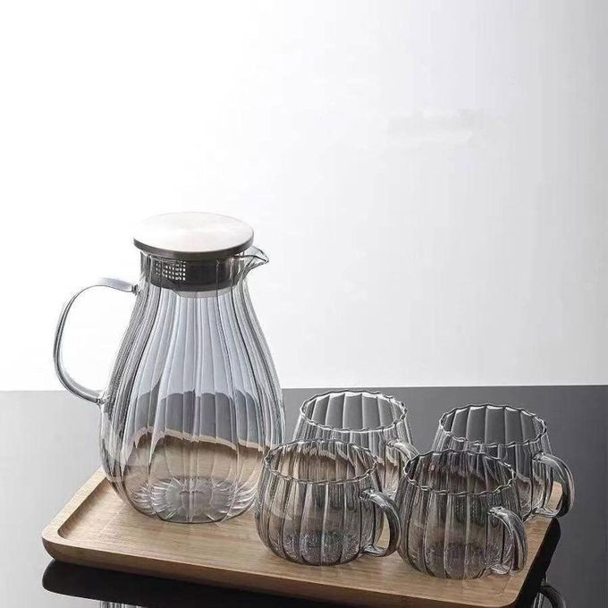 A Stylish Glass Tea Jug With Infuser And 4 Double-wallevd Glass Mugs, Perfect For Brewing, Serving, And Enjoying Tea.